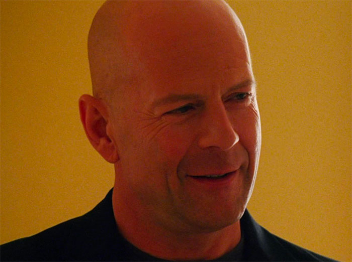 Bruce Willis smiling in movie Ocean's Twelve