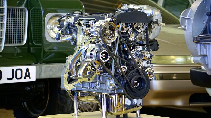 Picture of Internal combustion engine and car near