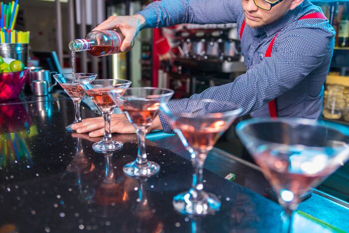 Bartender pouring a drink 