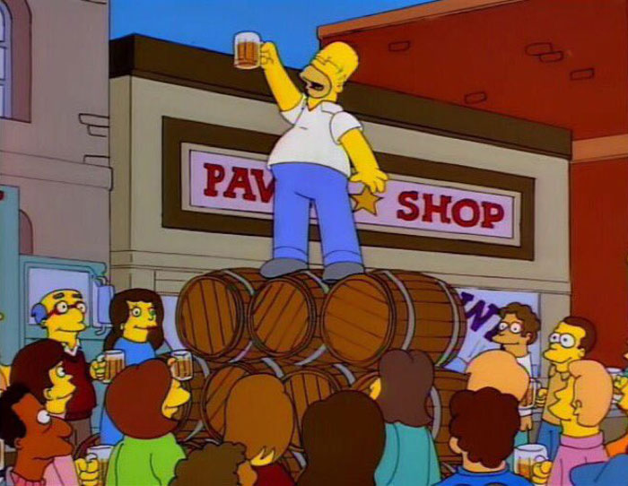 Homer rising a glass of beer 