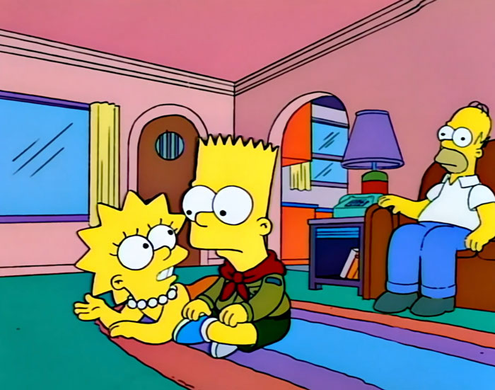 Bart and Lisa talking while watching tv