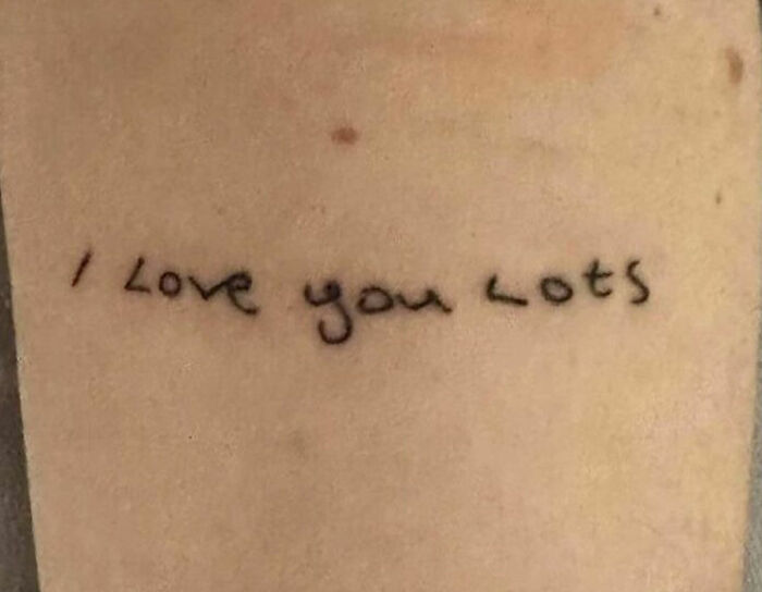 "I Love You Lots" phrase tattoo 