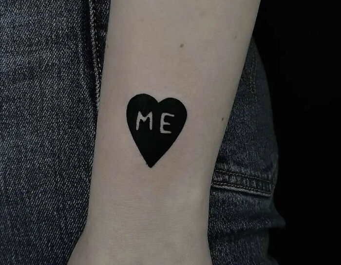 "Me" in the heart shape tattoo 