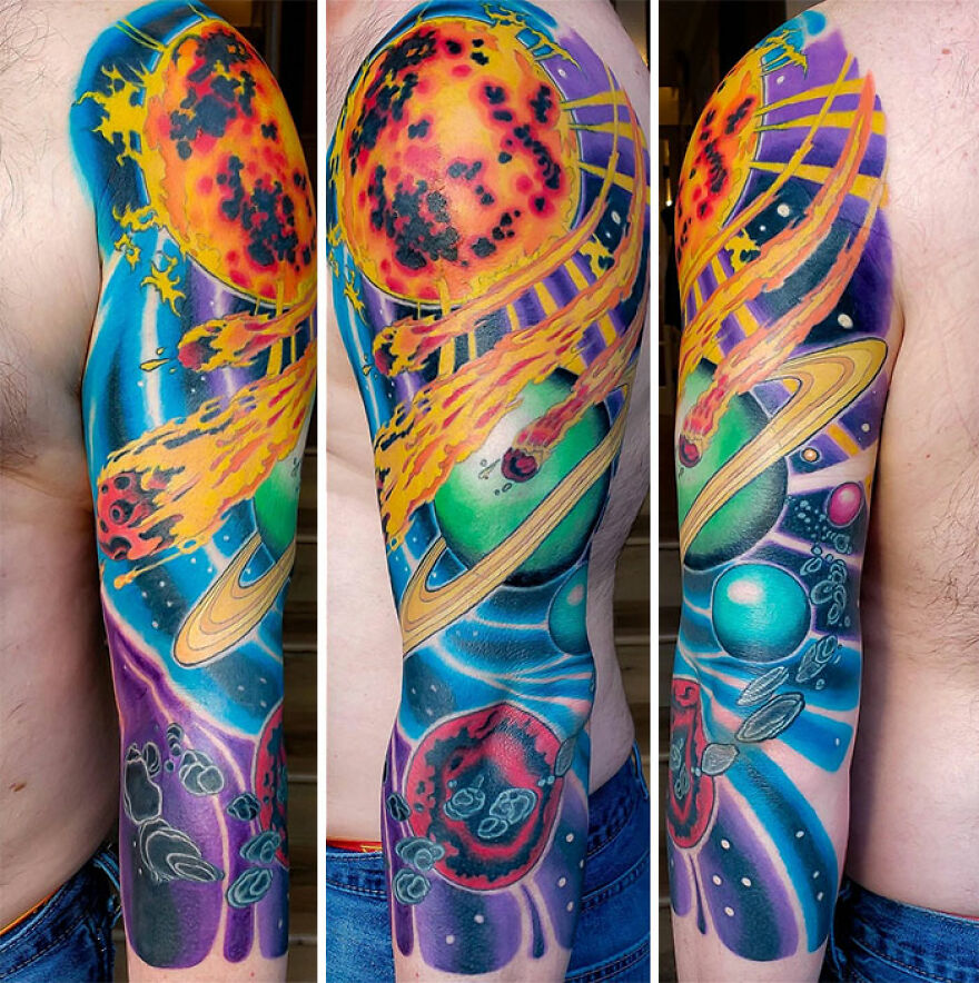 Outer space arm sleeve tattoo