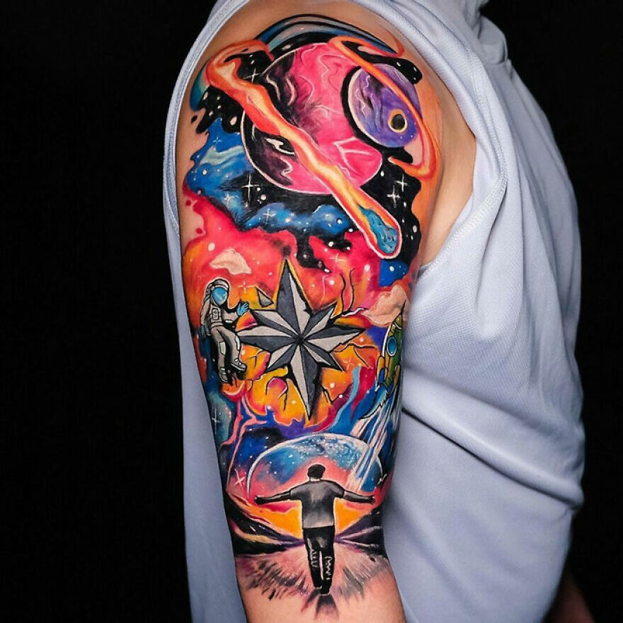Colorful space arm tattoo