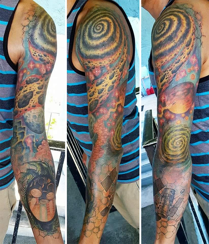 Space themed sleeve tattoo