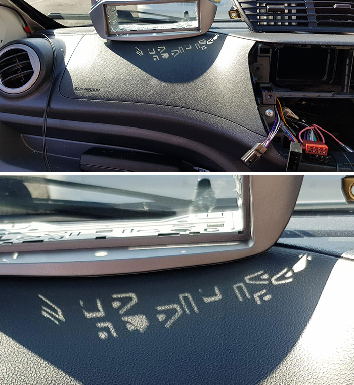 Changing My Friend's Car Radio When I Noticed This. The Shadow Looks Like An Alien Language
