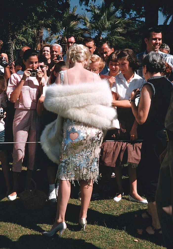 Marilyn Monroe Signing Autographs For Fans On The Set Of “Some Like It Hot” In Coronado Beach, California, Summer Of 1958. Photo By Richard Miller