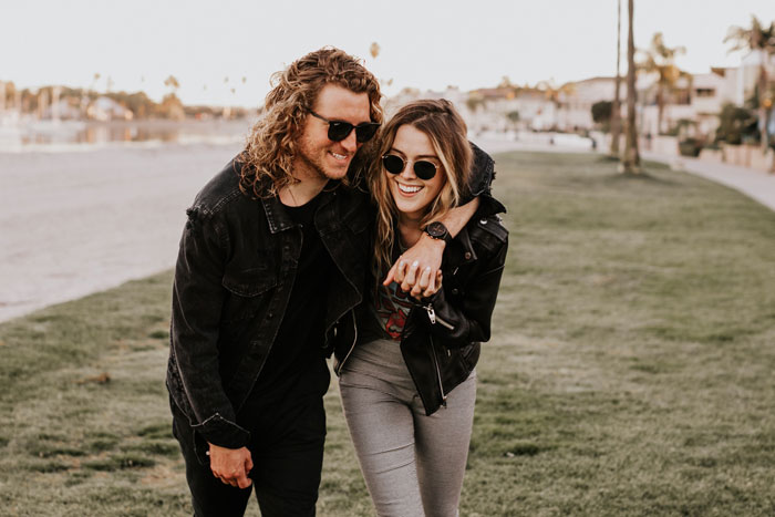 Hugging couple with black sunglasses