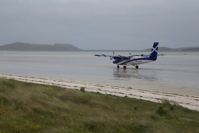 Picture of plane in Barra International airport in Scotland