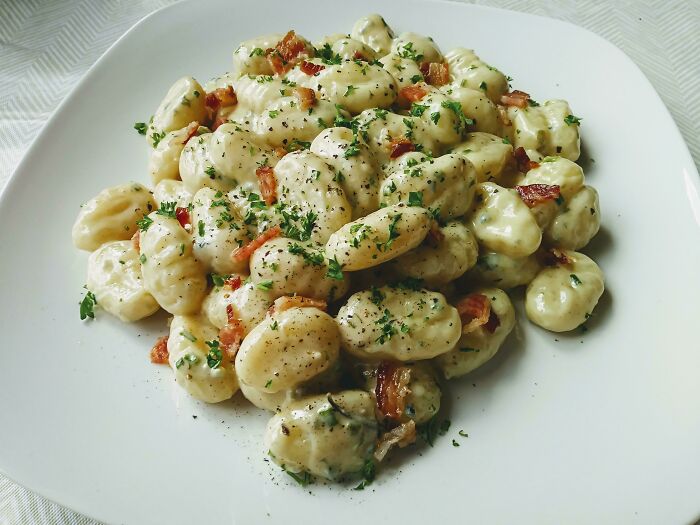 Gnocchi In A Blue Cheese/Chives Cream Sauce W/ Bacon, Black Pepper And Parsley