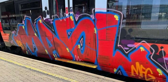 Interesting Graffiti On Train