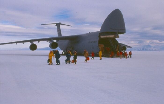 Picture of people going of the plane in Ice Runway Antarctica
