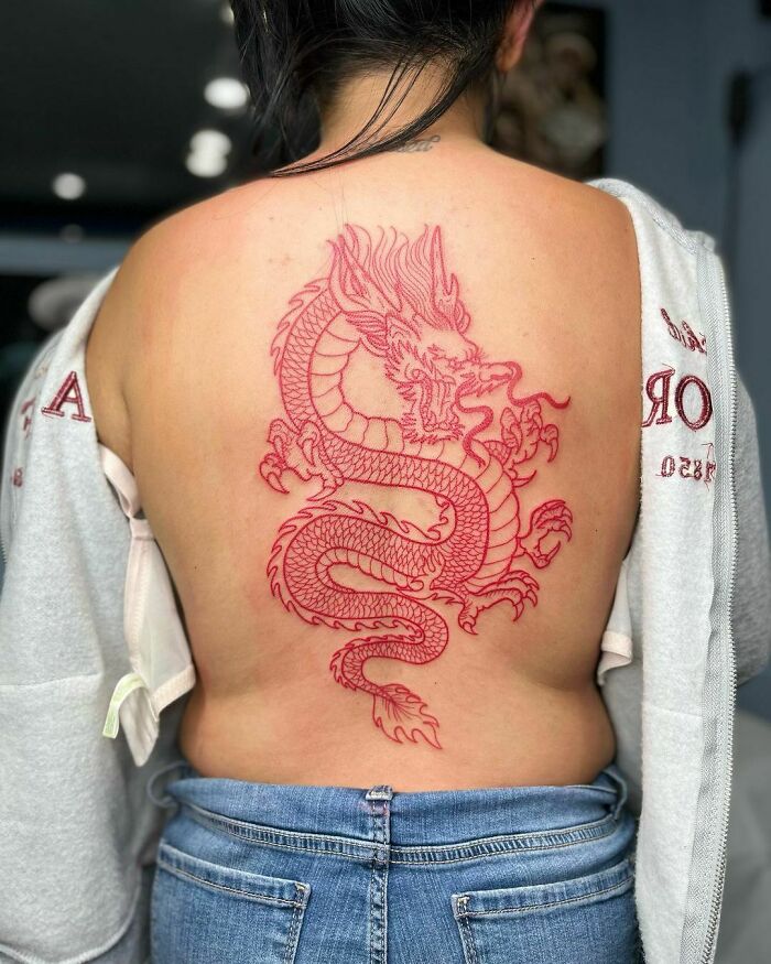 Red dragon back tattoo
