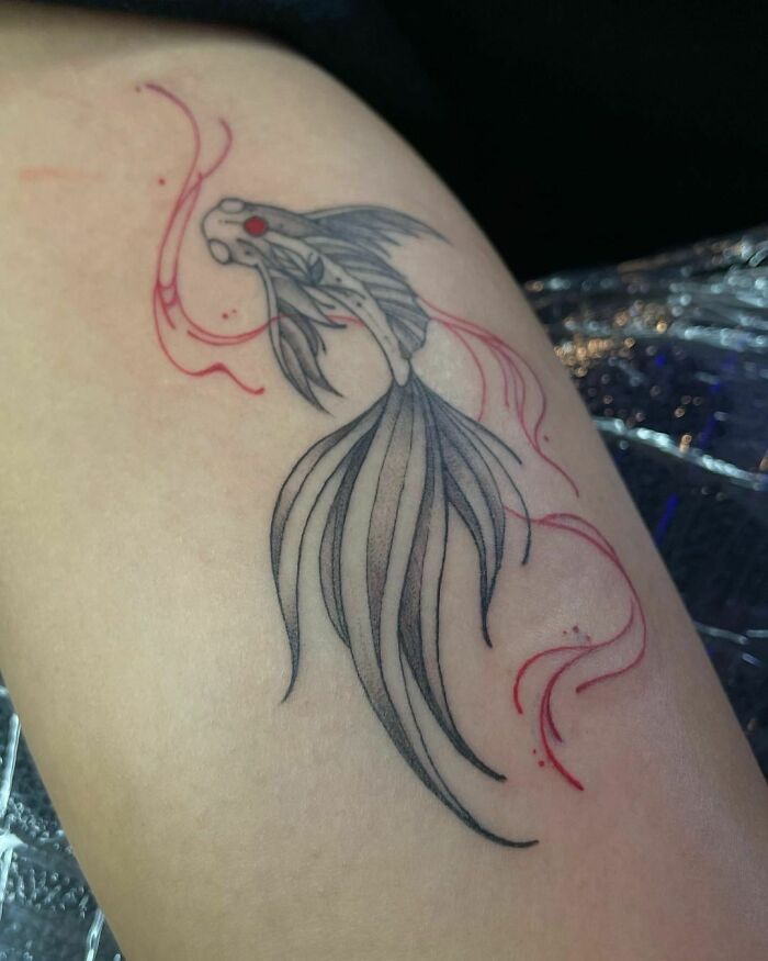 Black koi fish tattoo 