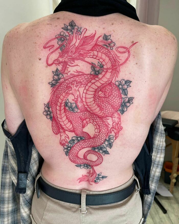 Red dragon flower back tattoo 