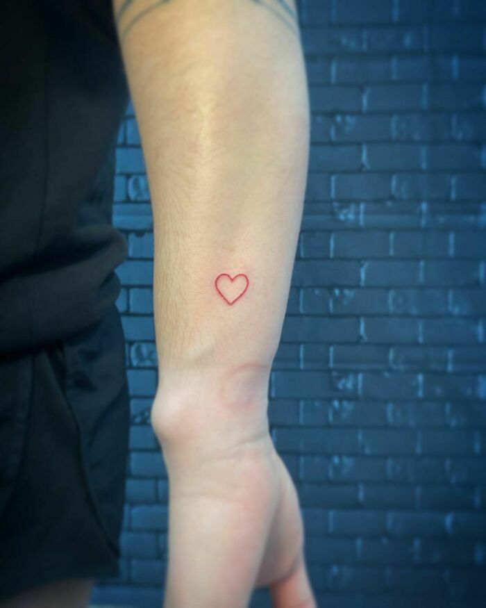 Small red heart tattoo 