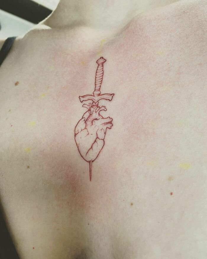 Sytabbed heart red ink tattoo 