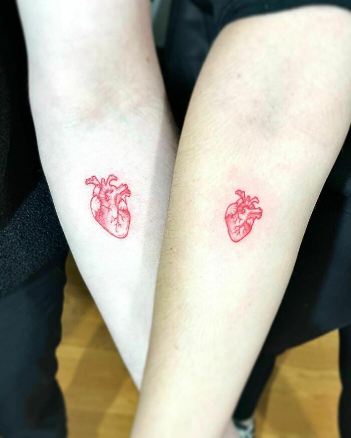 Red heart matching tattoo 