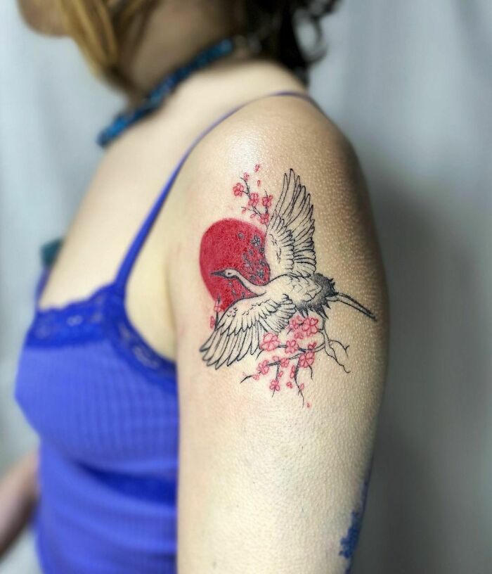 Red Ink Stork Tattoo
