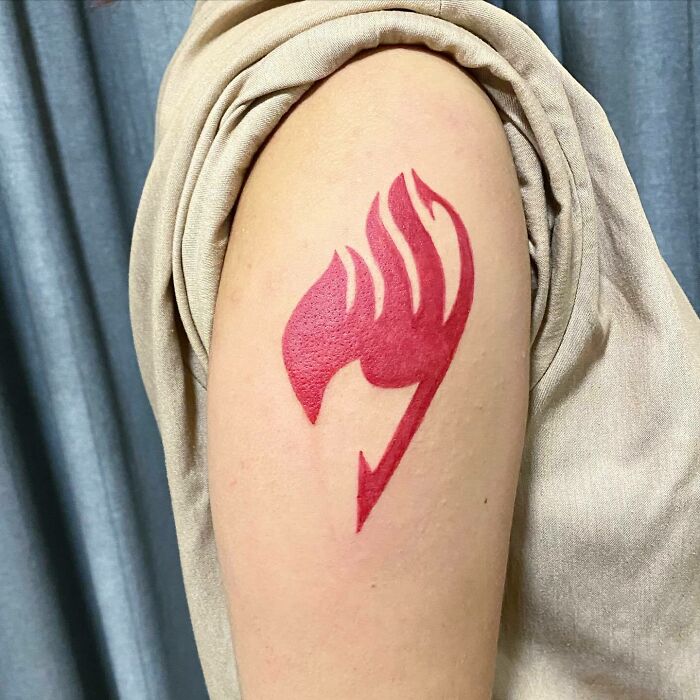 Red Ink Flame Heart Tattoo