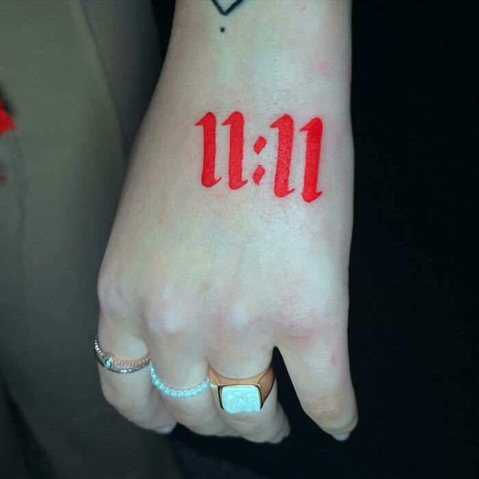 11:11 red tattoo 