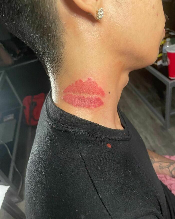 Kiss Mark Red Ink Tattoo