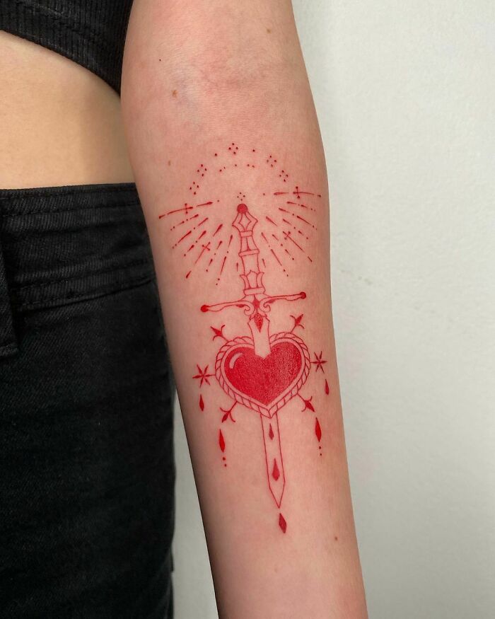 Sword going through the heart tattoo 