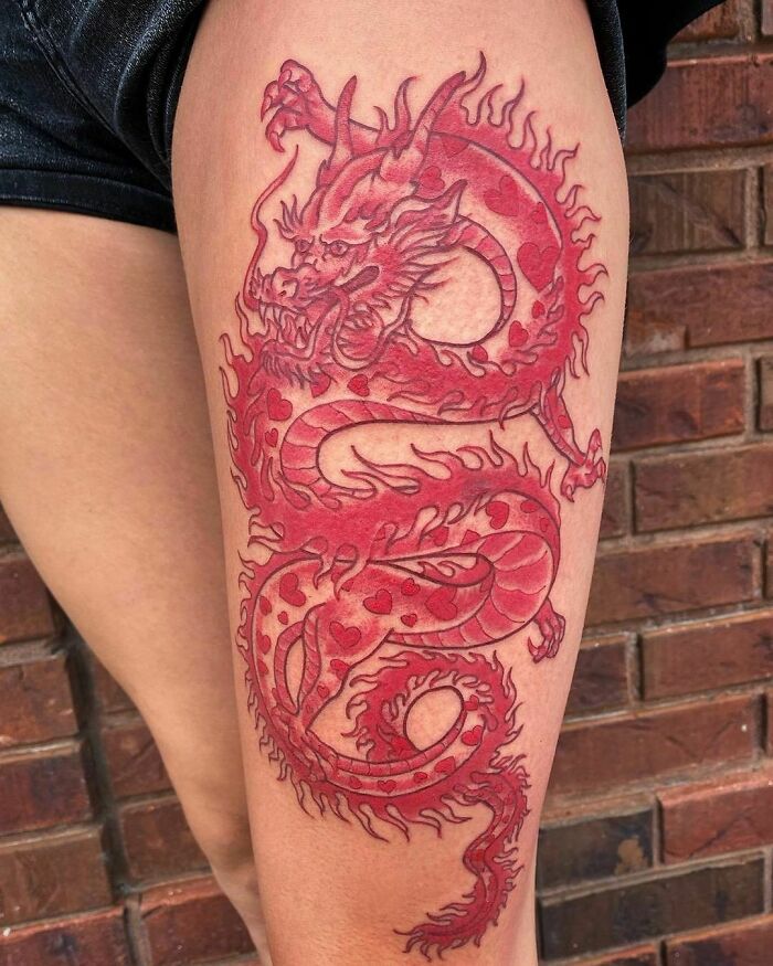 Red dragon leg tattoo 