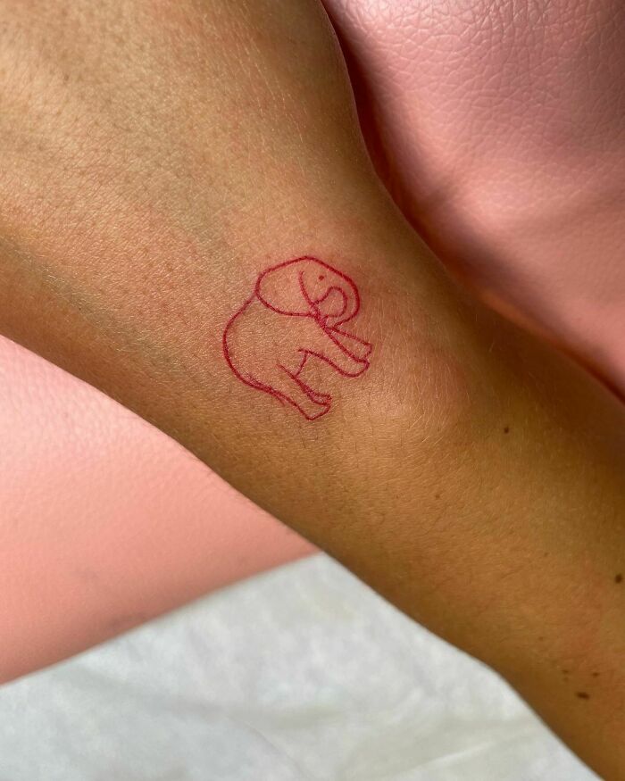 Elephant Red Ink Tattoo
