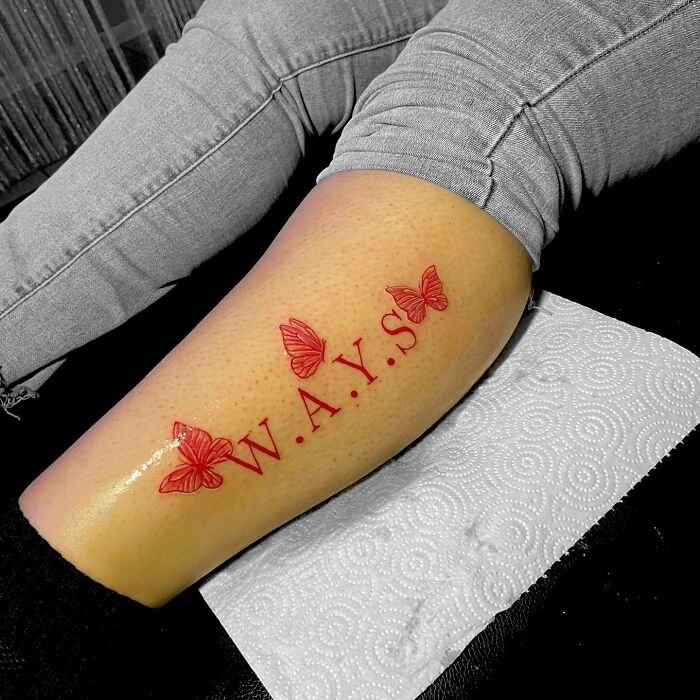 W.A.Y.S and red butterflies leg tattoo