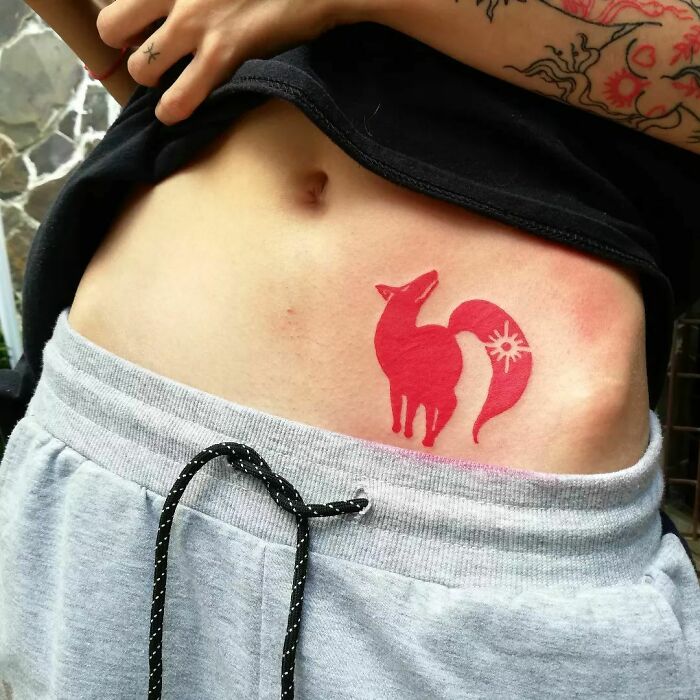 Red animal tattoo