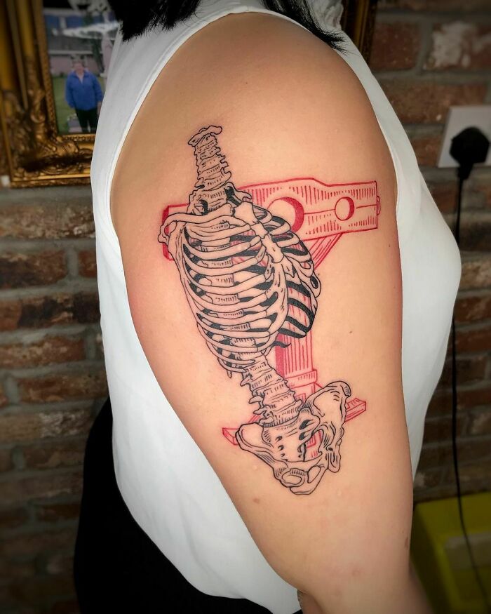 Skeleton arm tattoo 