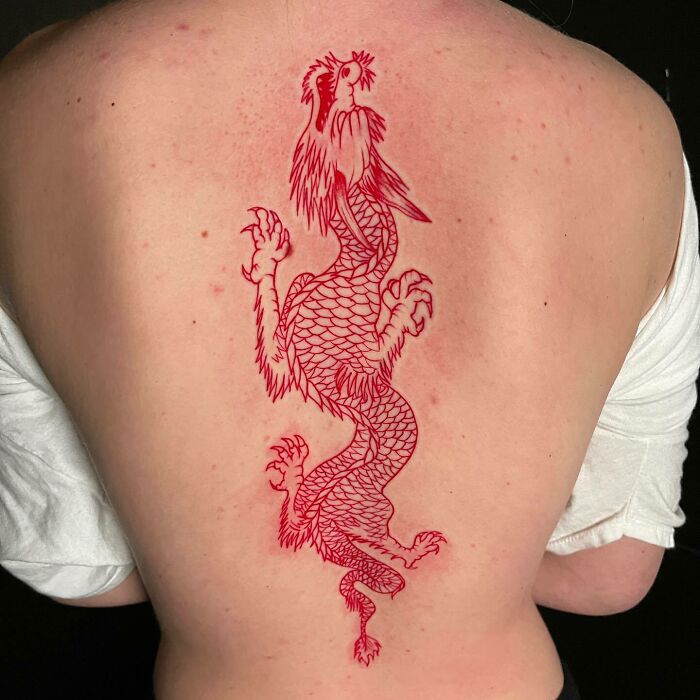 Red dragon back tattoo 