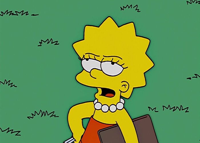 Lisa holding brown paper holder