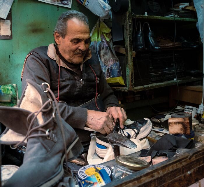Man Repairing Shoes