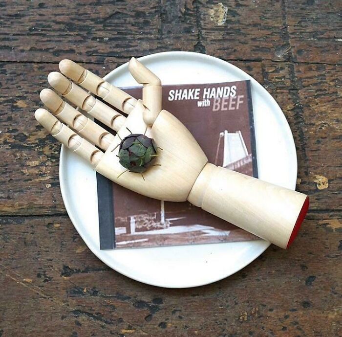 Beef Tartare Served On A Wooden Hand. Part Of A Primus-Themed Menu At A Michelin-Starred Restaurant, The Musket Room