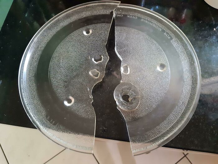 My Microwave Plate Snapped In Half After A Red-Glowing Molten Glass Hole Appeared