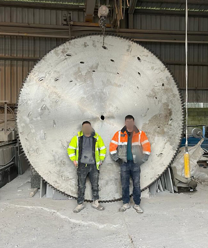This Absolute Unit Of A Stone Cutting Blade In My Work. People For Scale