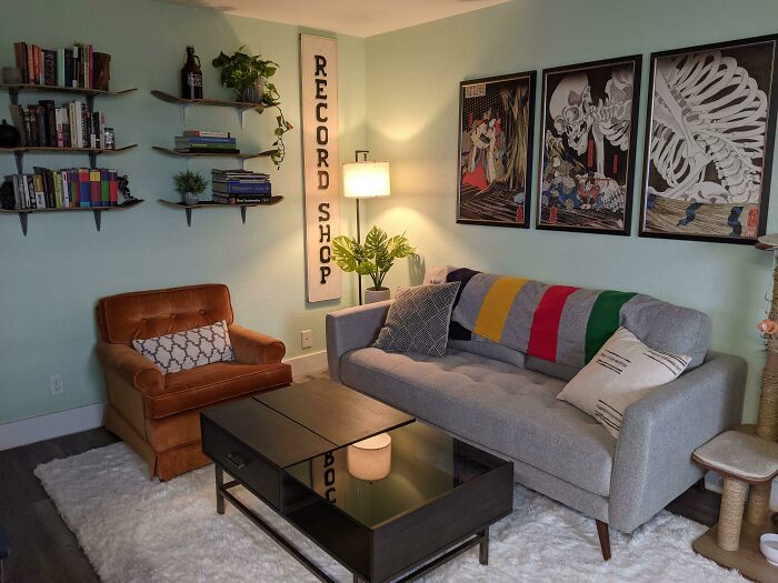 Photography of living room with art wall