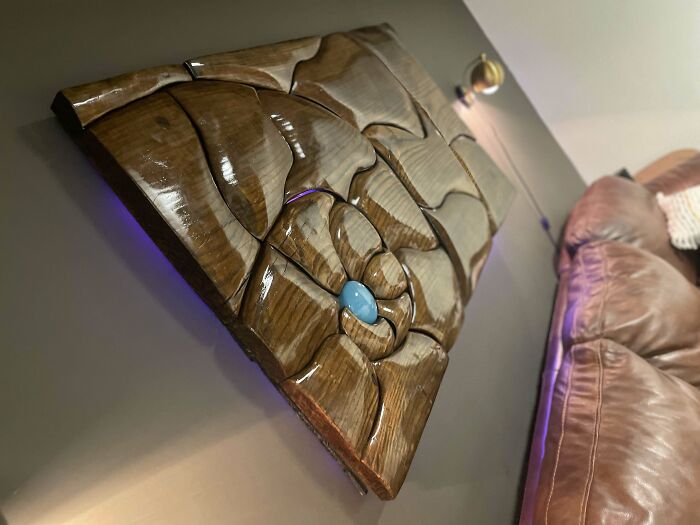 Wood piece of art on the wall 