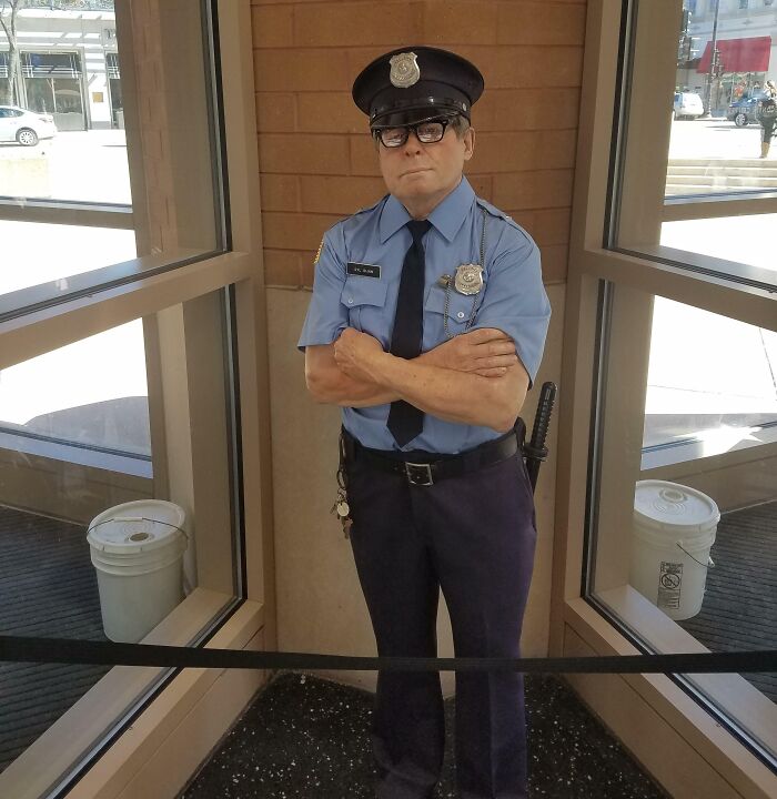 This Building Had A Realistic Statue Of A Police Officer
