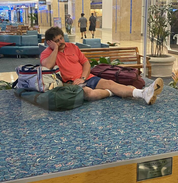 Realistic Sculpture Titled “The Traveler” In Orlando International Airport