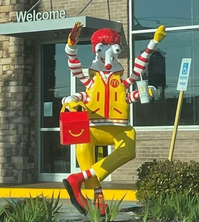This Ronald McDonald Statue In Front Of The McDonald's