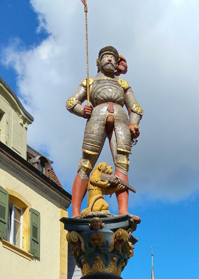 Statue In Switzerland With A Codpiece So Prominent, It Almost Makes You Miss The Lion With The Shotgun