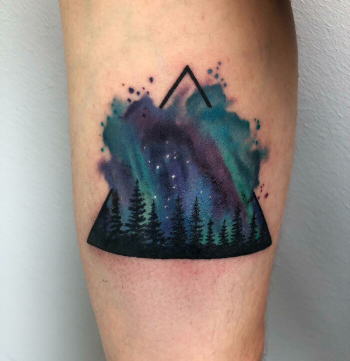Tattoo uploaded by Peter Laeviv  The Northern Lights are actually the  result of collisions between gaseous particles in the Earths atmosphere  with electrically charged particles released from the suns atmosphere  Variations