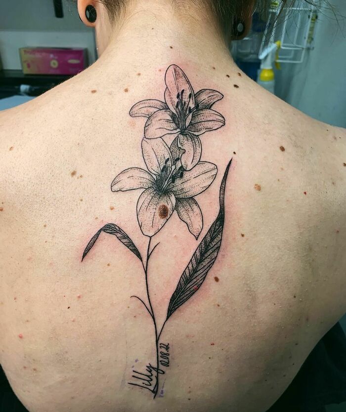 Floral Spine Tattoo