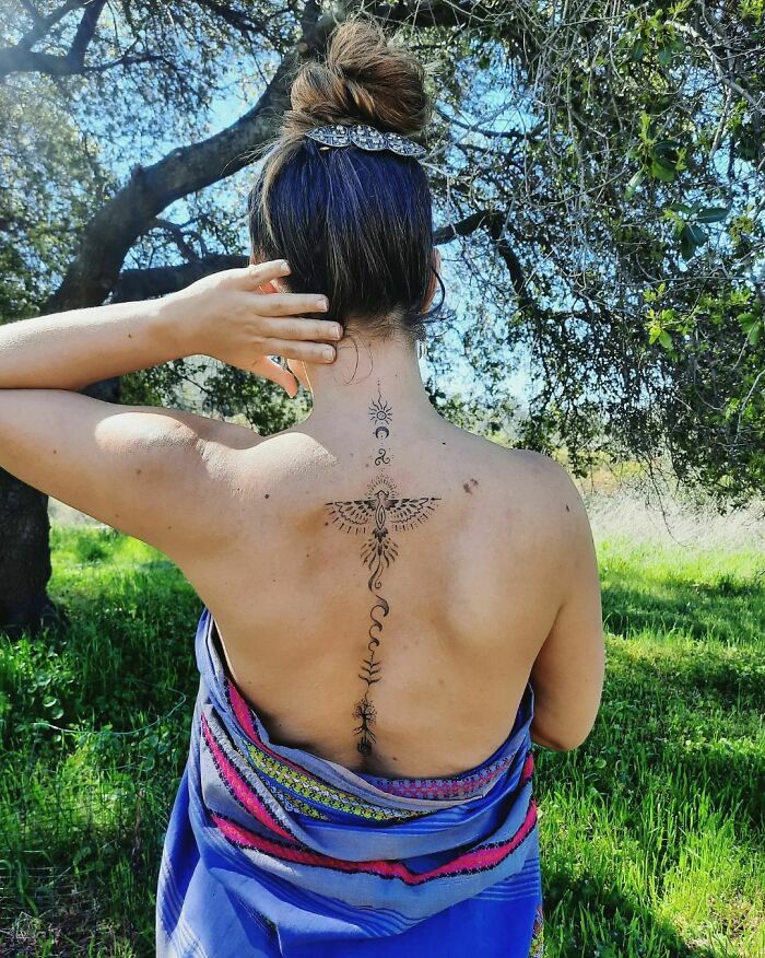 Phoenix, moon, sun and waves tattoo 