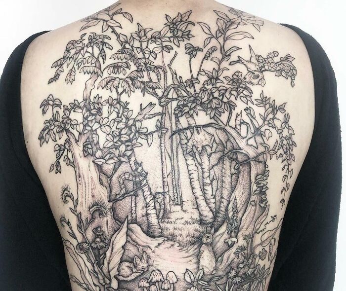 Nature tattoo on back