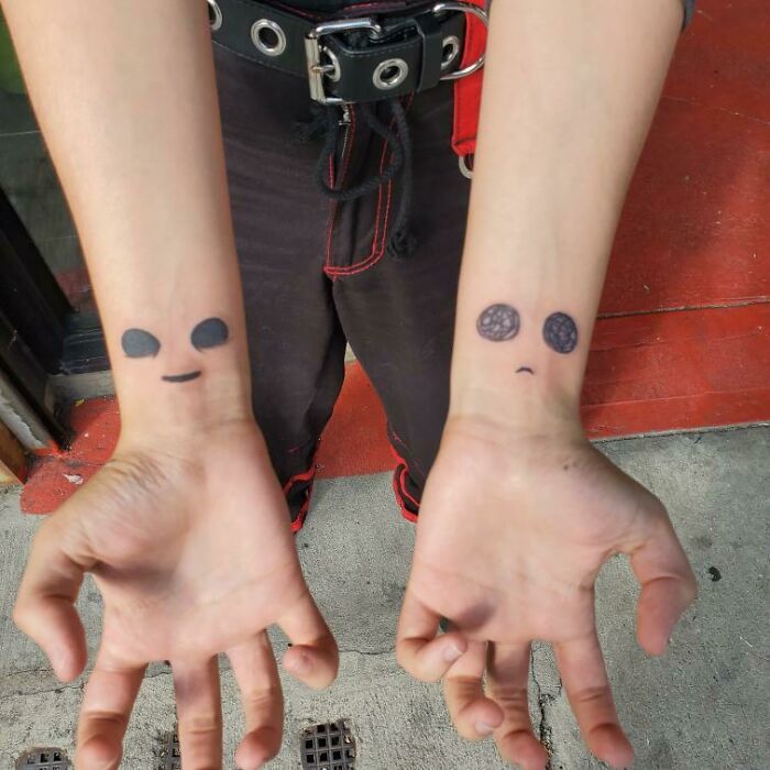 Smiles wrists tattoos